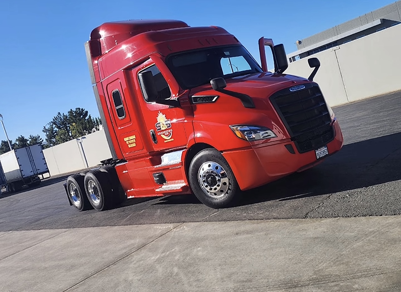 Soltero & Sons red Freightliner cab close-up